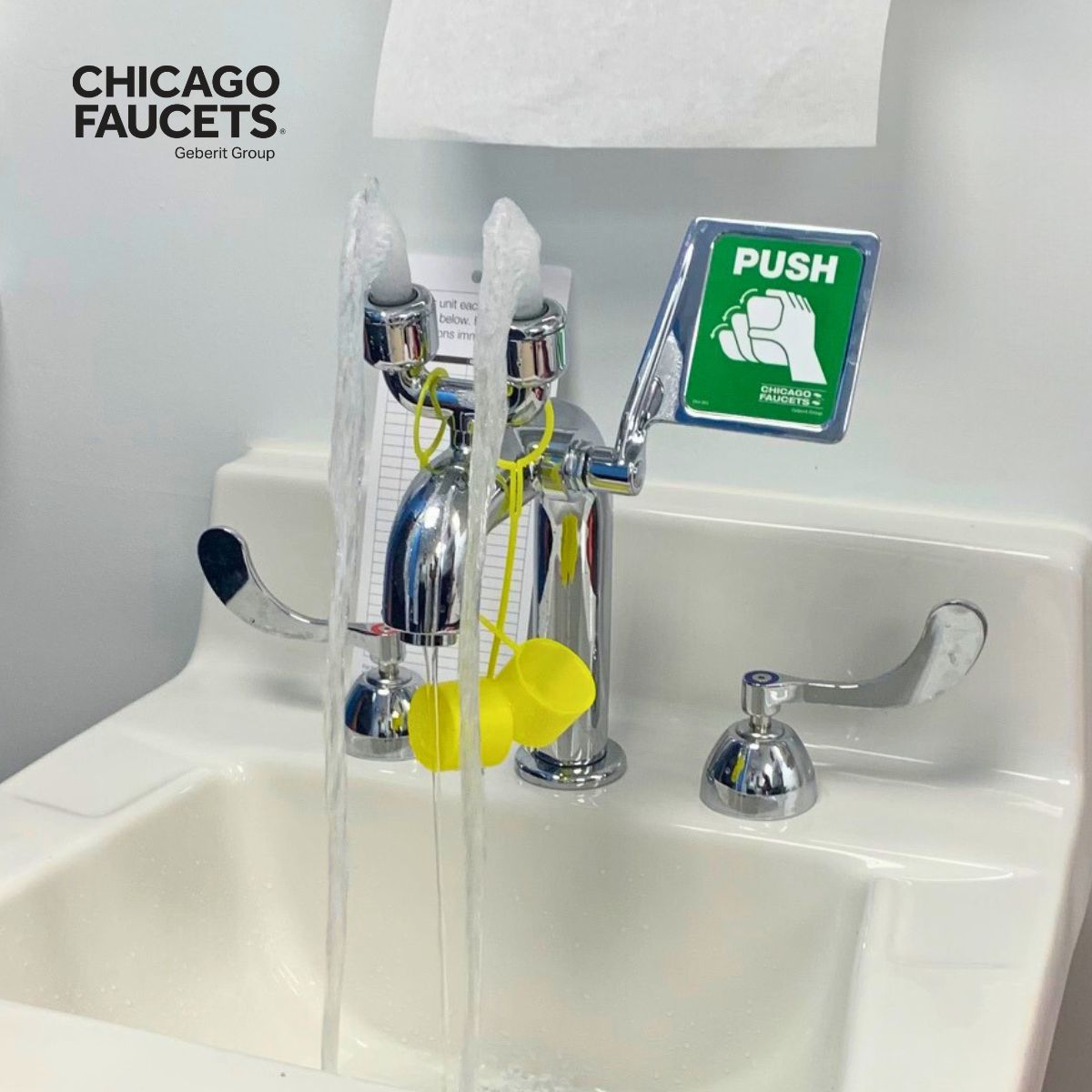 chrome dual handle gooseneck faucet with attached eyewash with large push handle 