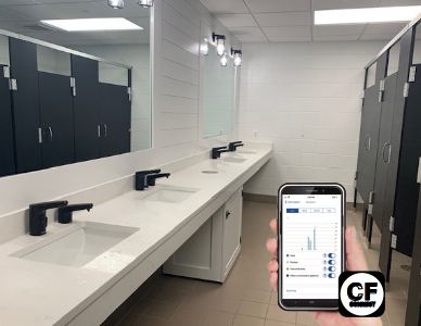 bathroom with hand with phone Commander app open